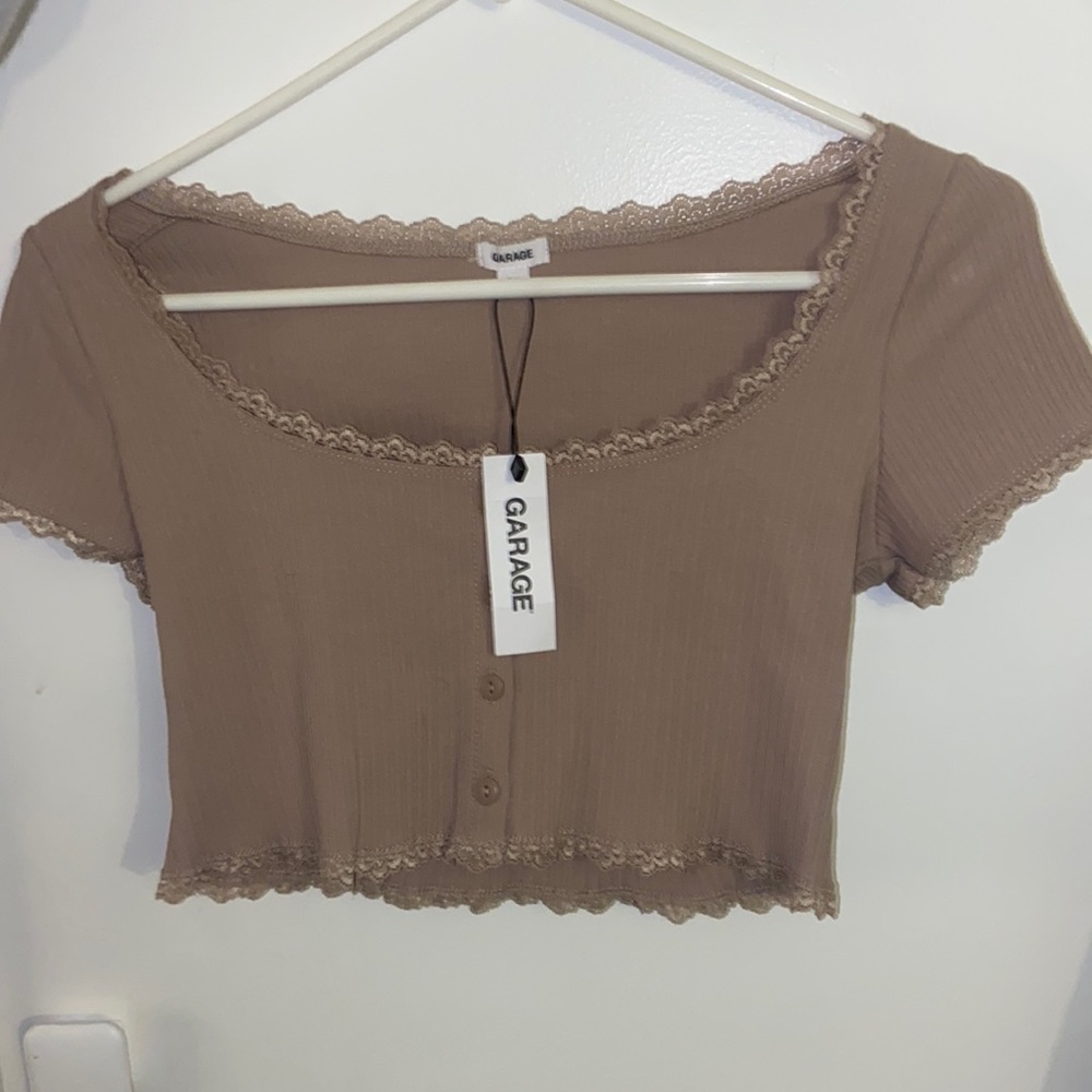 Brand new garage baby T with tags